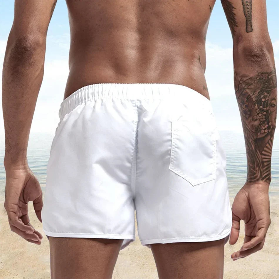 2025 Men's summer surf beach shorts Fitness jogging breathable sports shorts Sexy swimming shorts Fashion casual shorts
